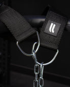 Close-up of the heavy-duty steel chain and carabiner attached to the Fortex dip belt.